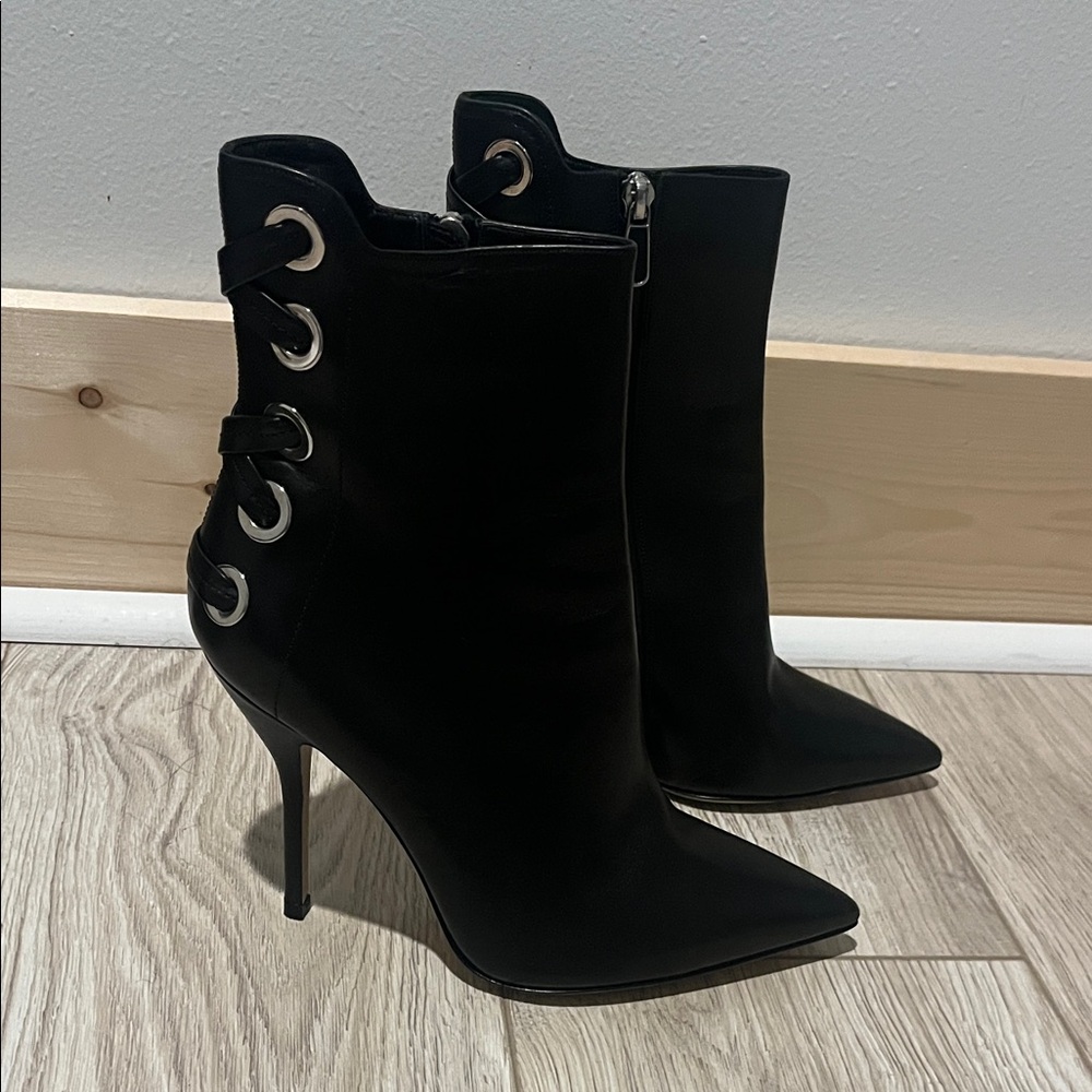 Paul Andrew’s Black Stiletto Ankle Boots with Grommet Detail